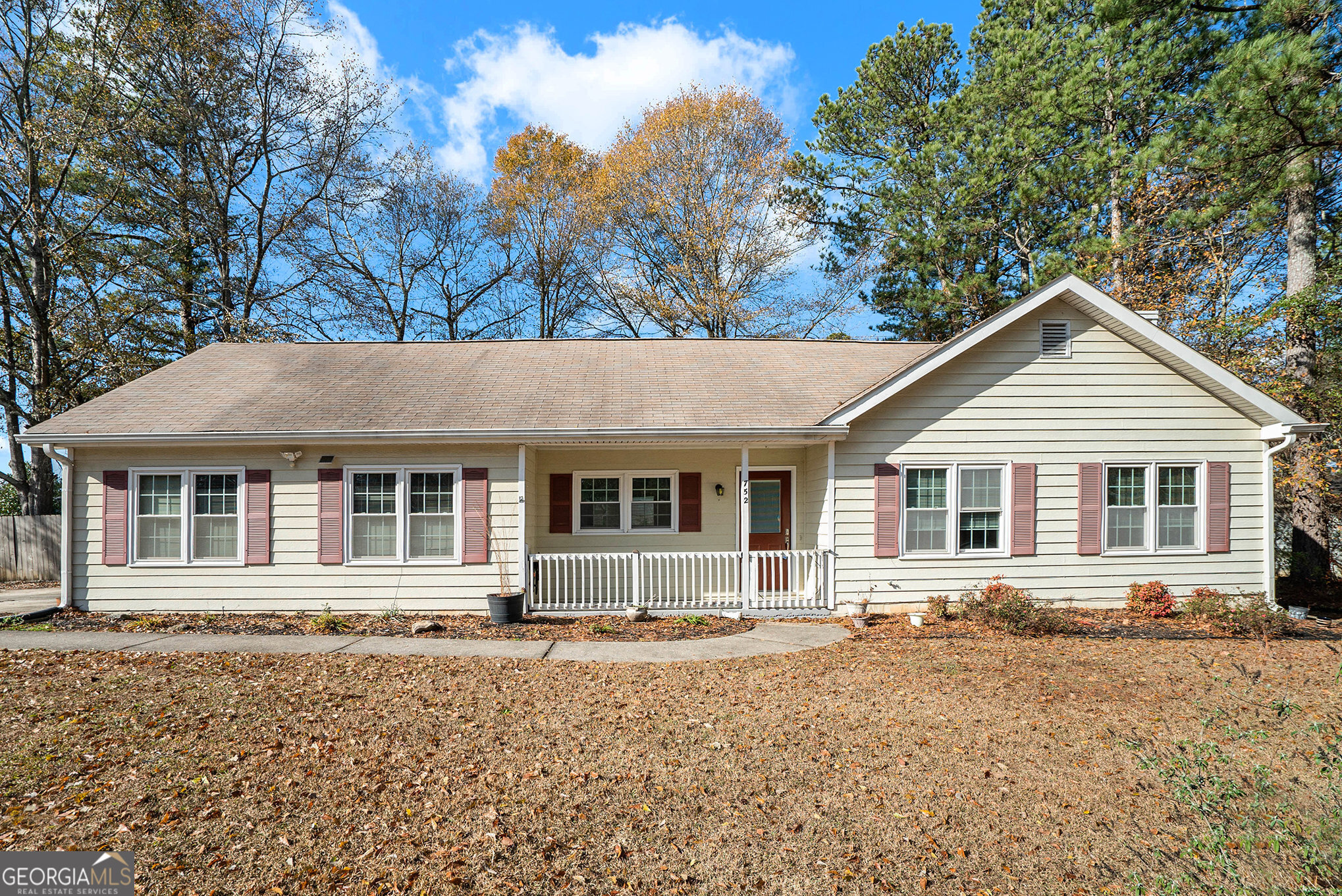 front view of a house with a yard