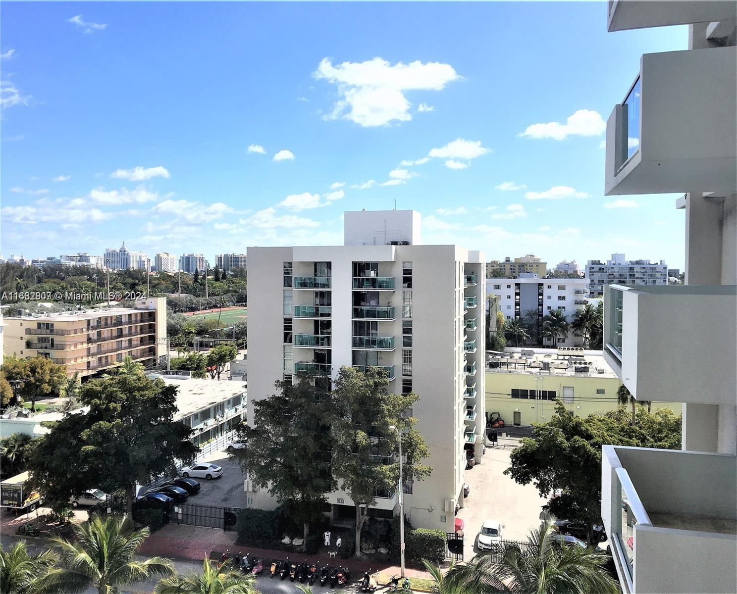 a view of a city with tall buildings