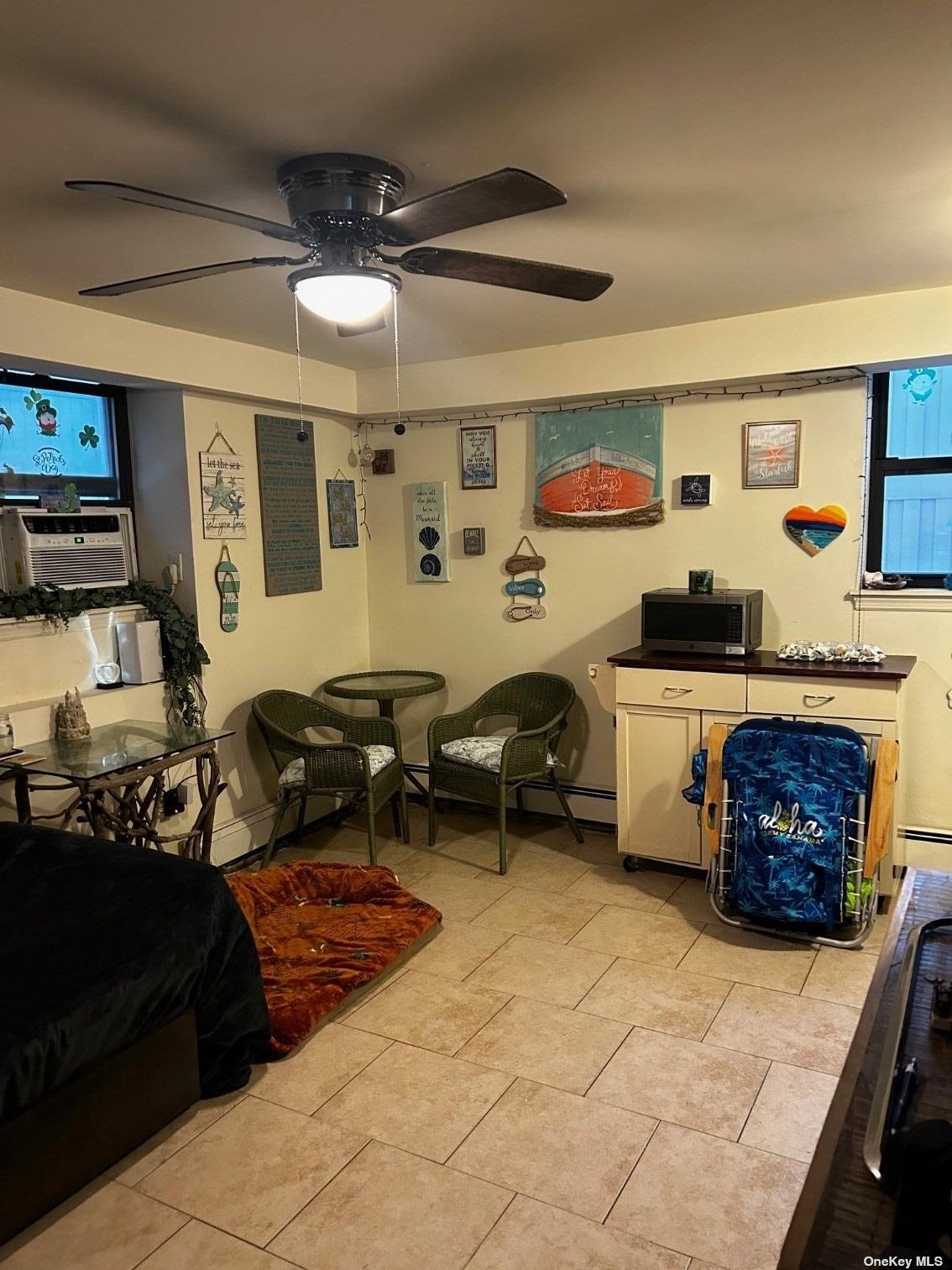 a living room with furniture and window