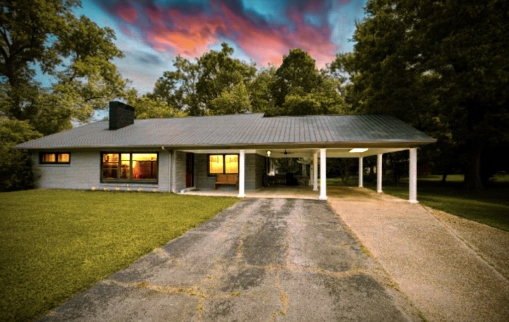 front view of a house with a yard