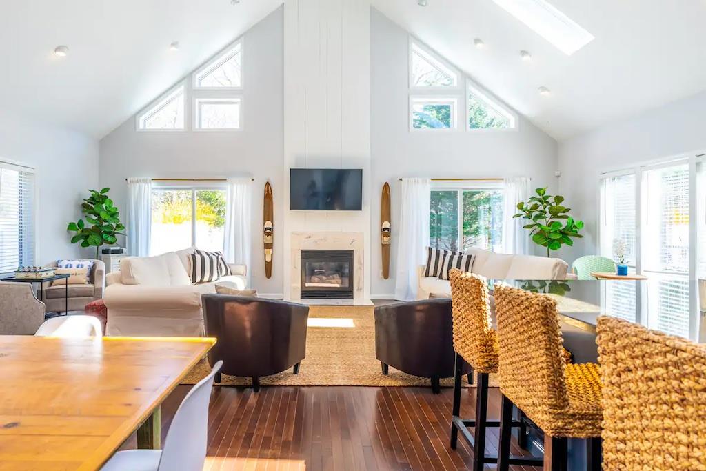 Living room with plenty of natural light and high vaulted ceiling