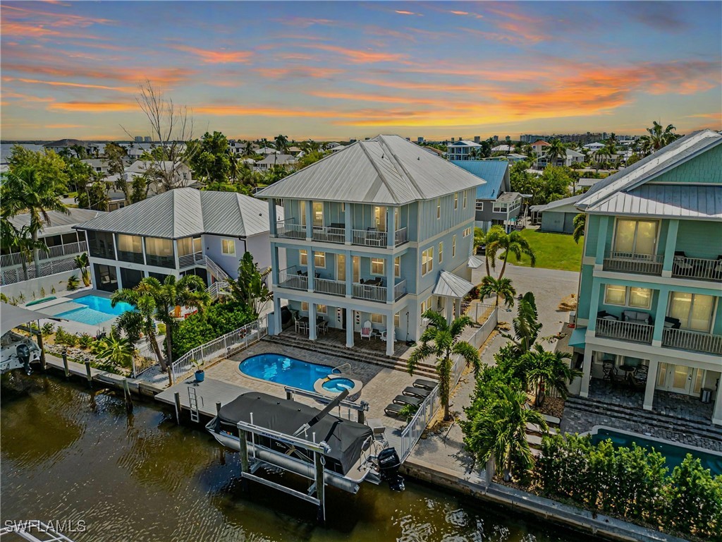 an aerial view of a house with a garden space