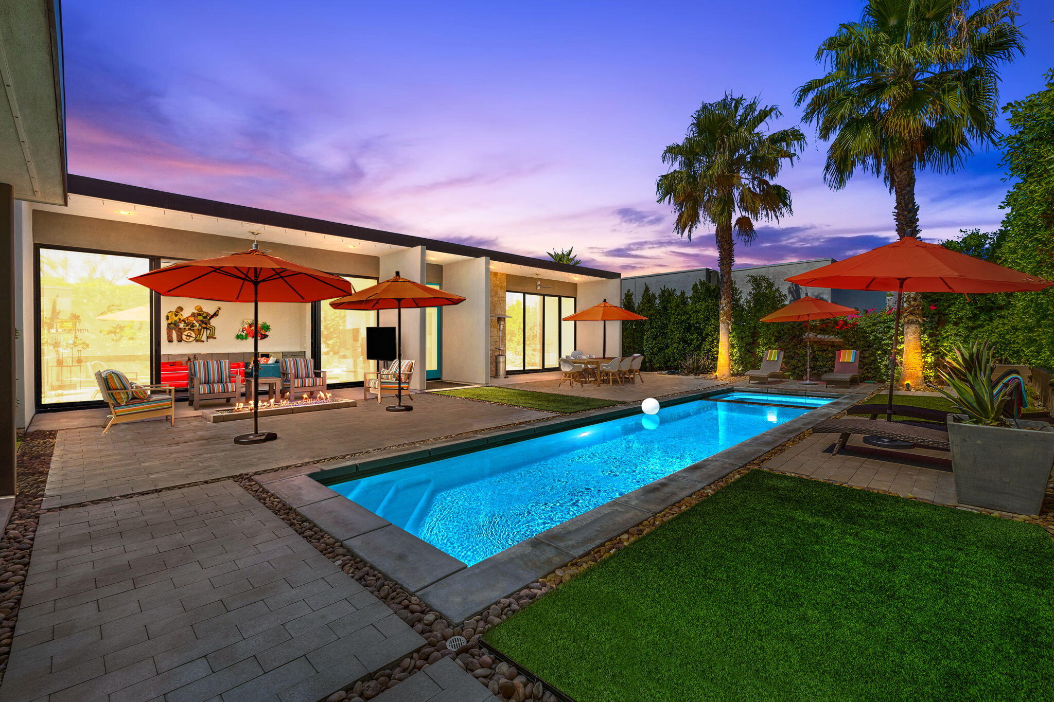 swimming pool with outdoor seating and yard