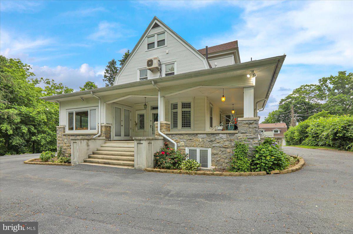 front view of a house with a street