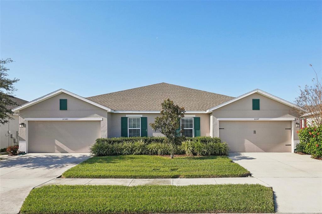 front view of a house and a yard