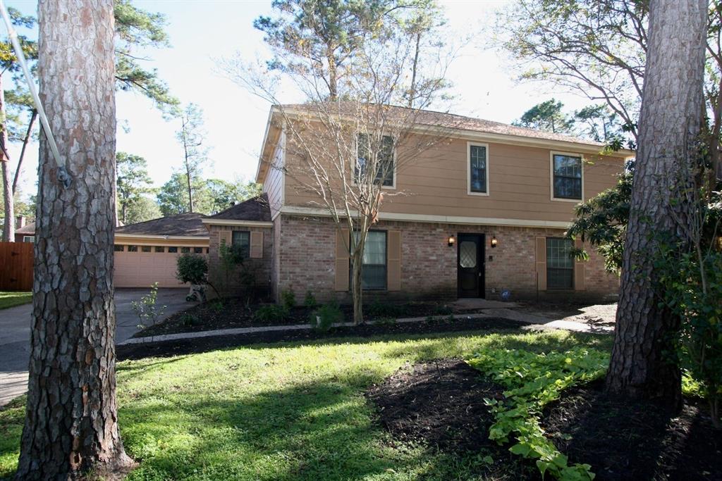 a view of a back yard of the house