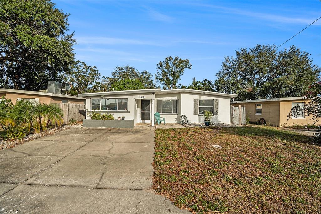 front view of a house with a patio