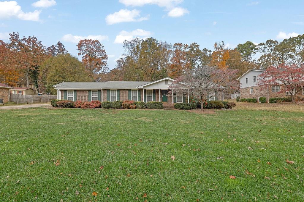 a view of a house with a big yard