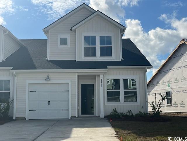 View of front facade with a garage