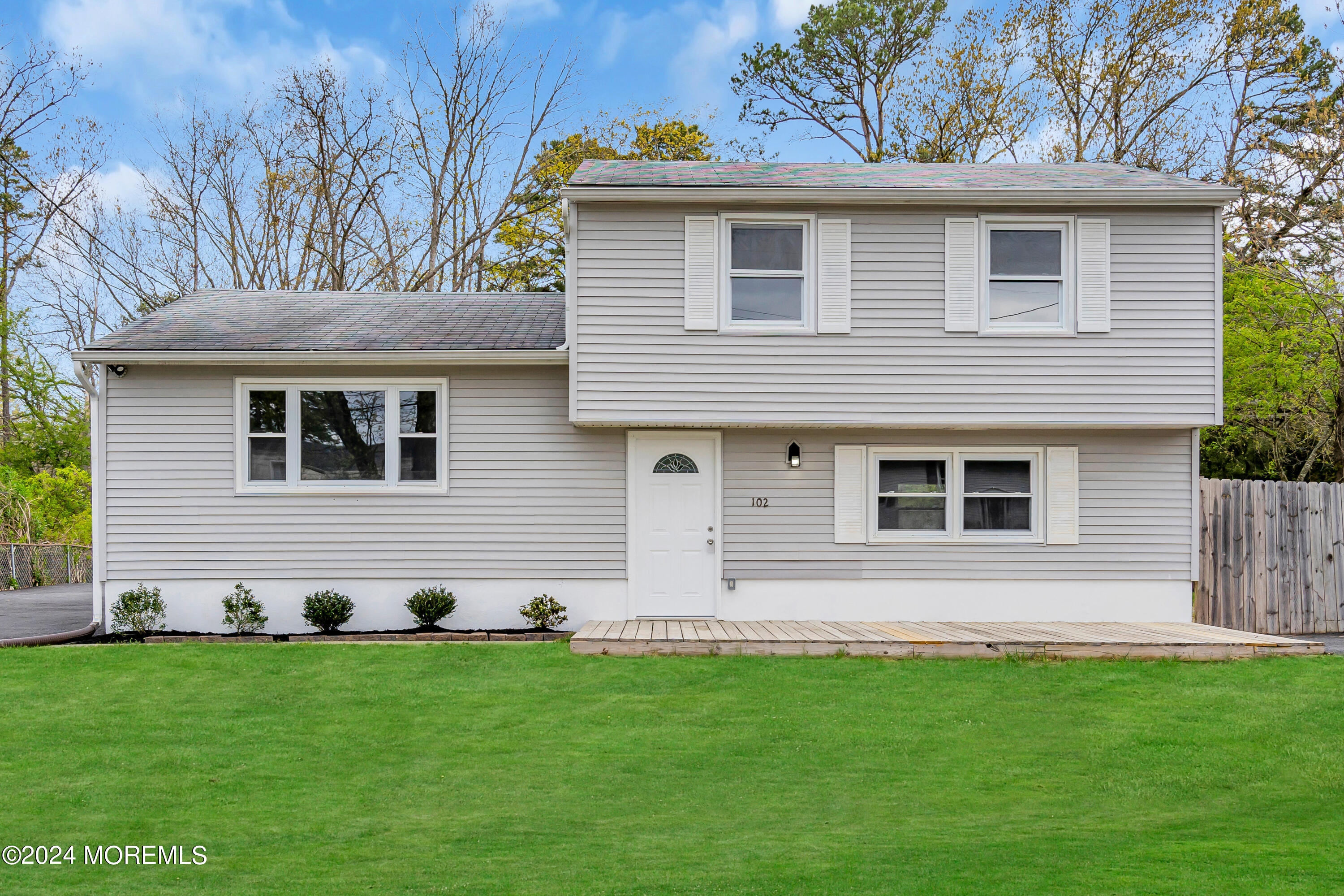 a front view of house with yard