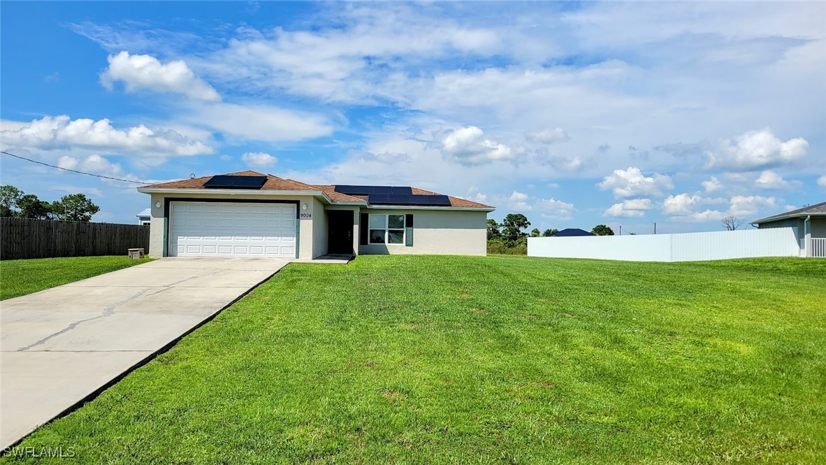 a front view of house with yard