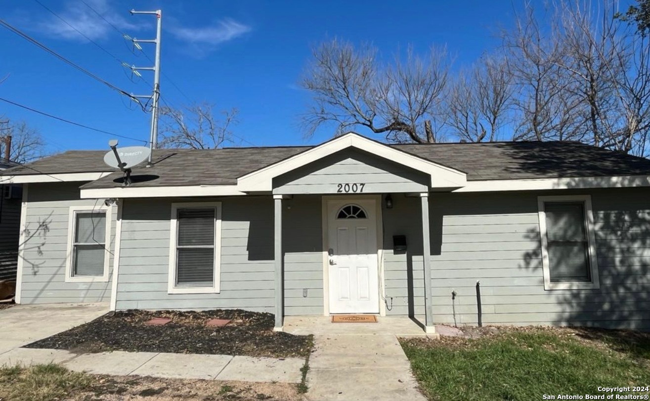 a front view of a house with a garage