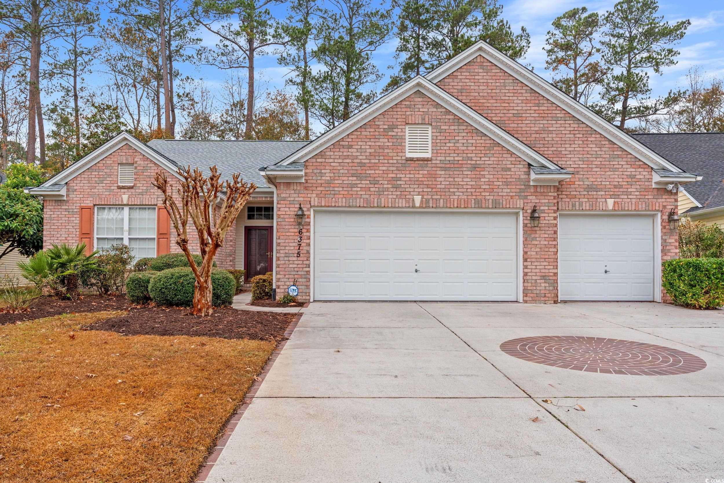 View of front property featuring a garage