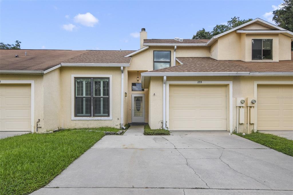 Just North of Cranes Roost Park with easy access to I-4 this 3BD/2.5BA home has an UPDATED KITCHEN and FLOORING, OPEN LIVING and DINING, a rare FIREPLACE, MAIN FLOOR PRIMARY SUITE and a SCREENED LANAI overlooking a nice sized backyard! 