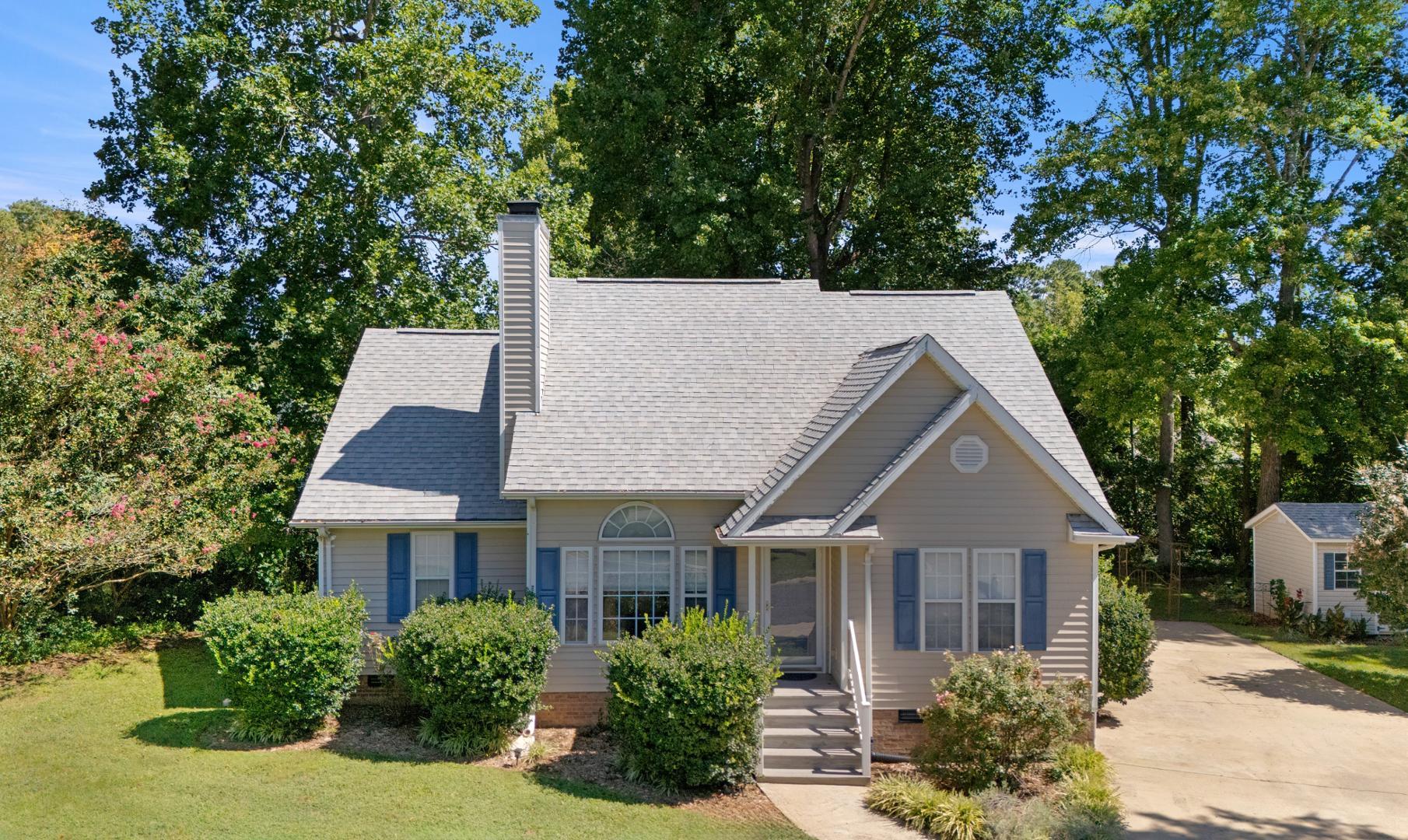 front view of a house with a yard