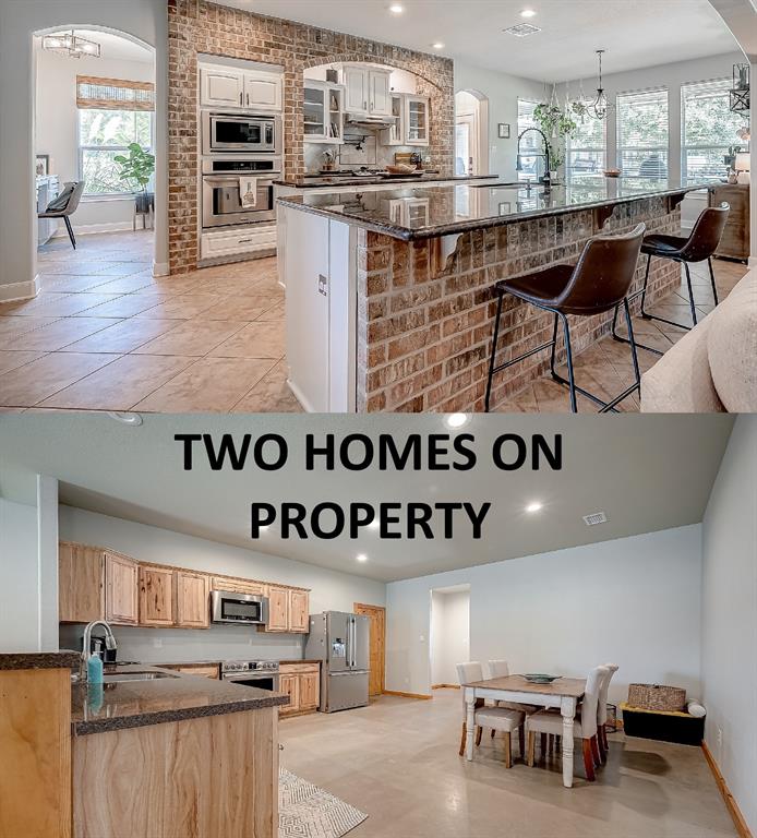 a kitchen with stainless steel appliances granite countertop a stove and cabinets