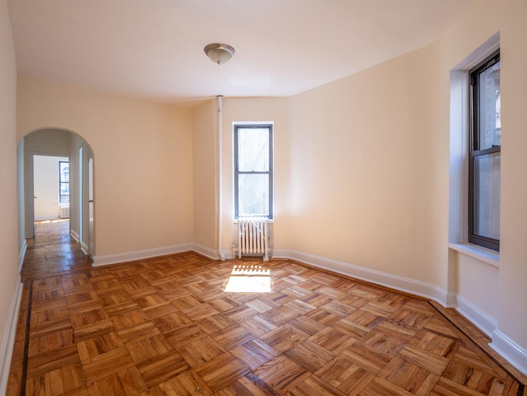 a view of an empty room and window