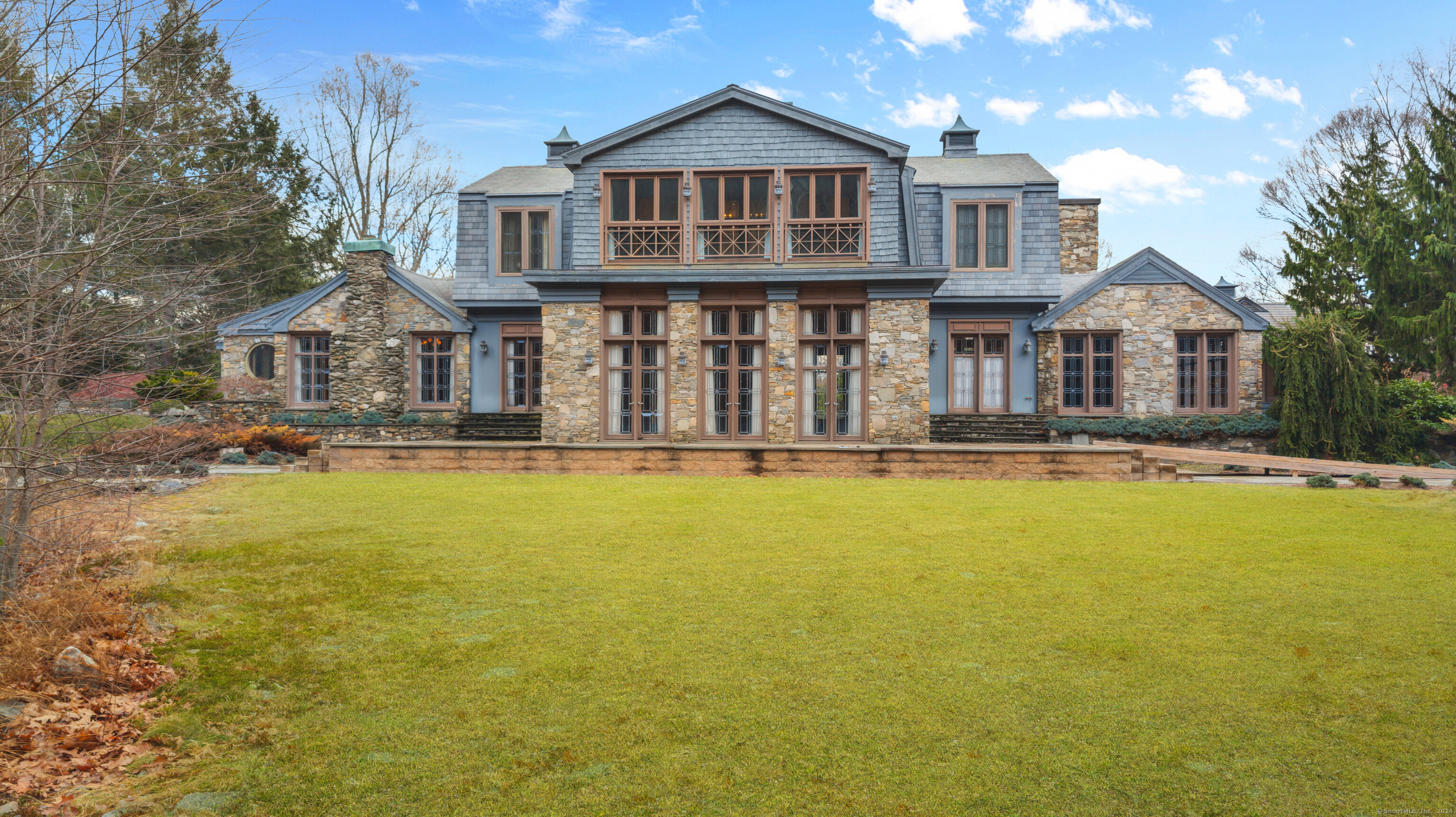 a front view of a house with swimming pool