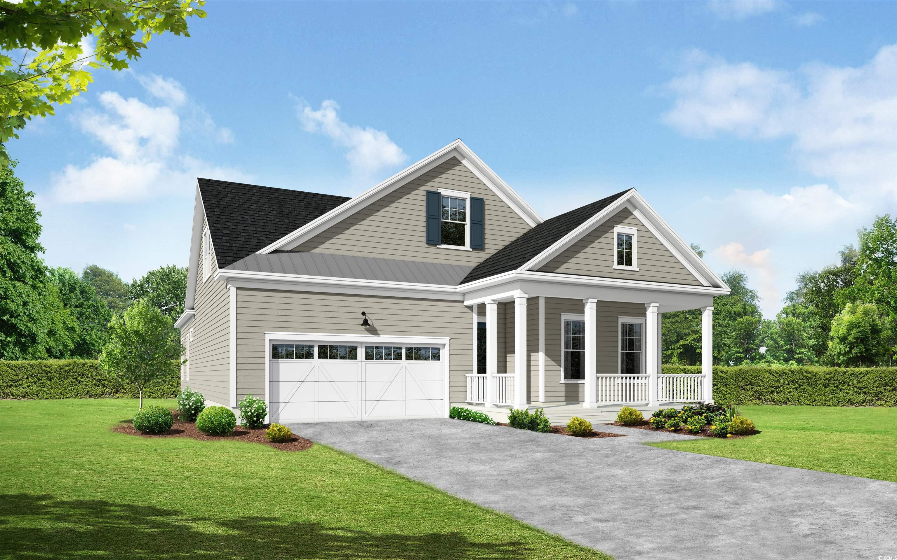 View of front of house with a porch, a garage, and