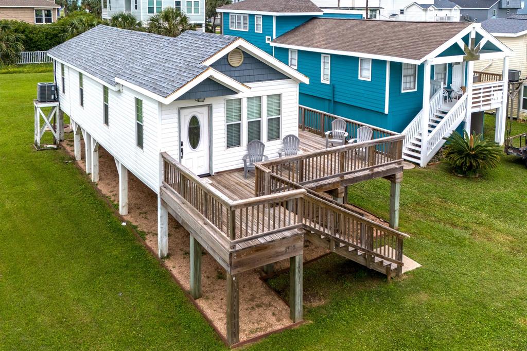 an outdoor space with wooden benches and stairs