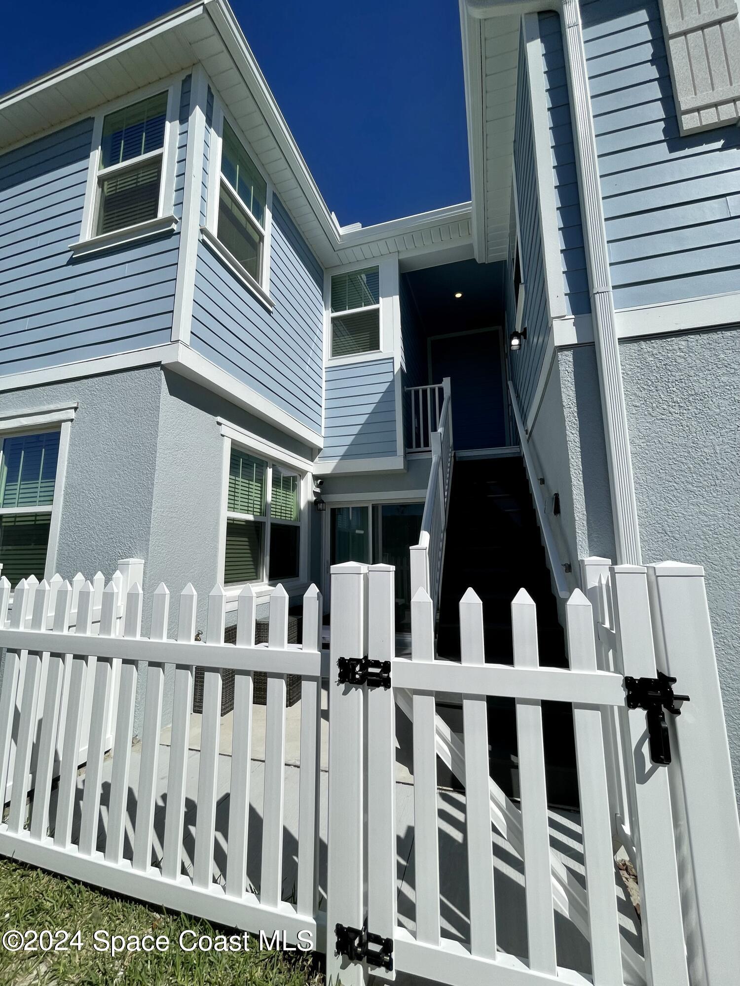 a front view of a house with a porch