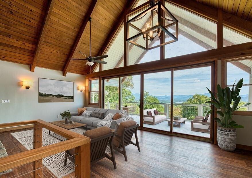 a view of a livingroom with furniture and garden