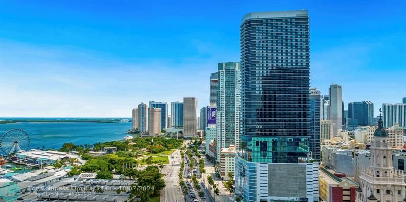 a view of a city with tall buildings