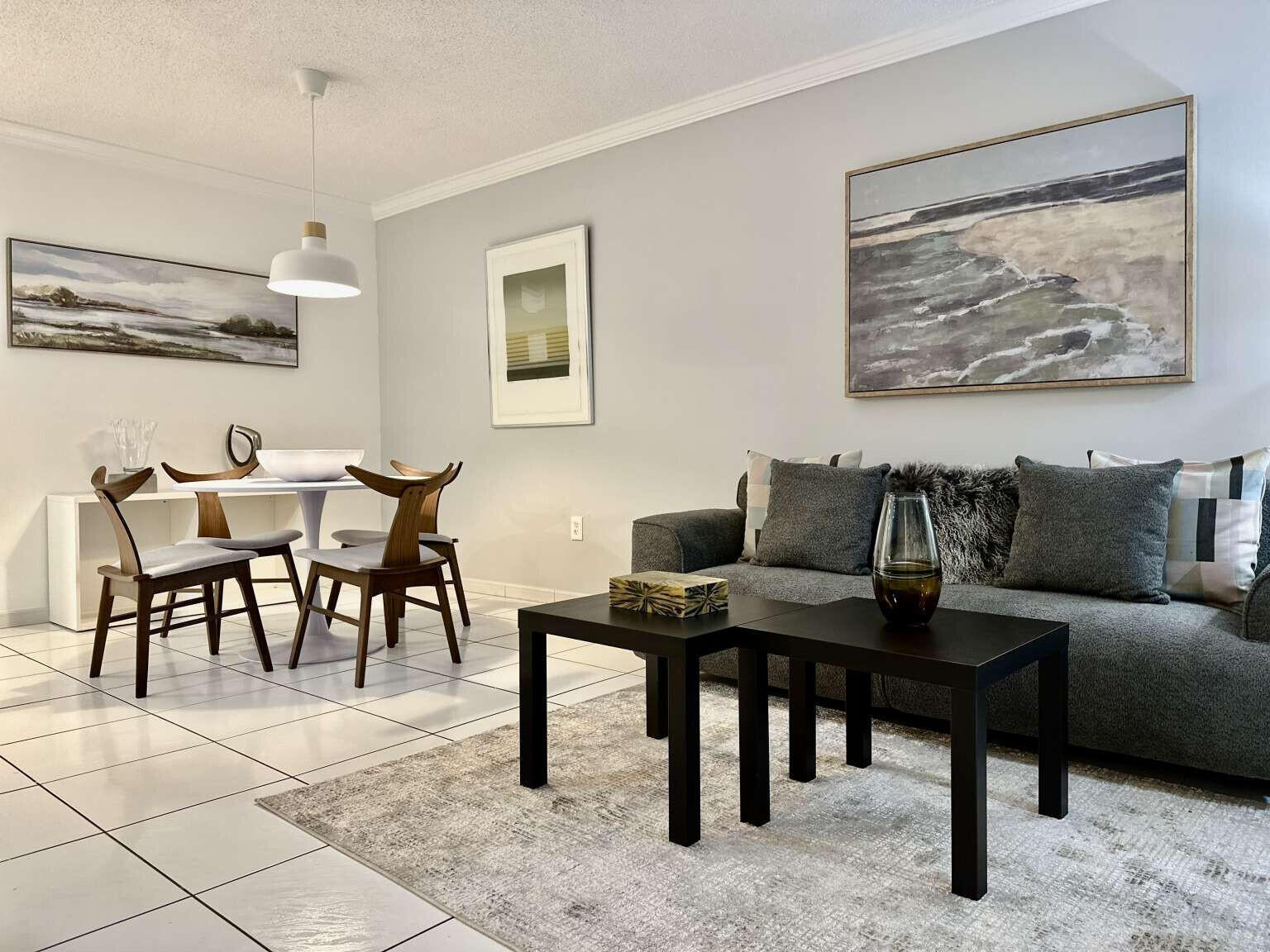 a view of a livingroom with furniture and a couch