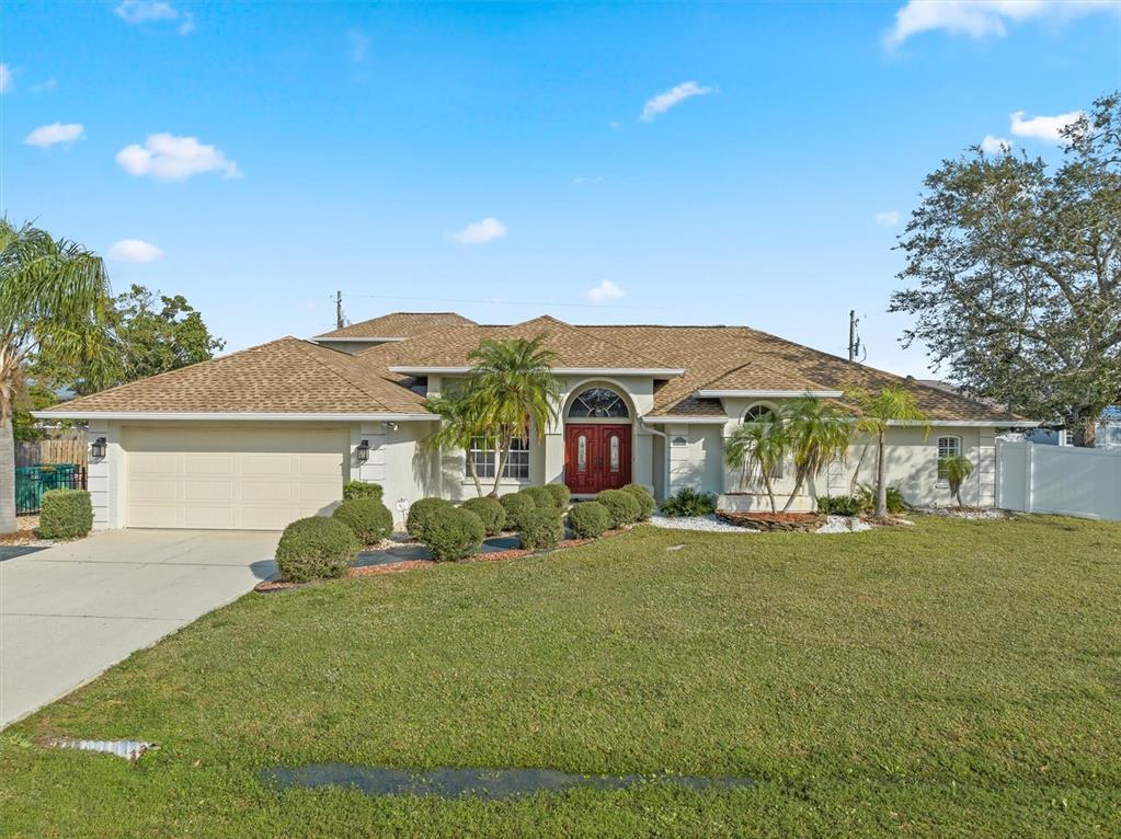 front view of a house with a yard