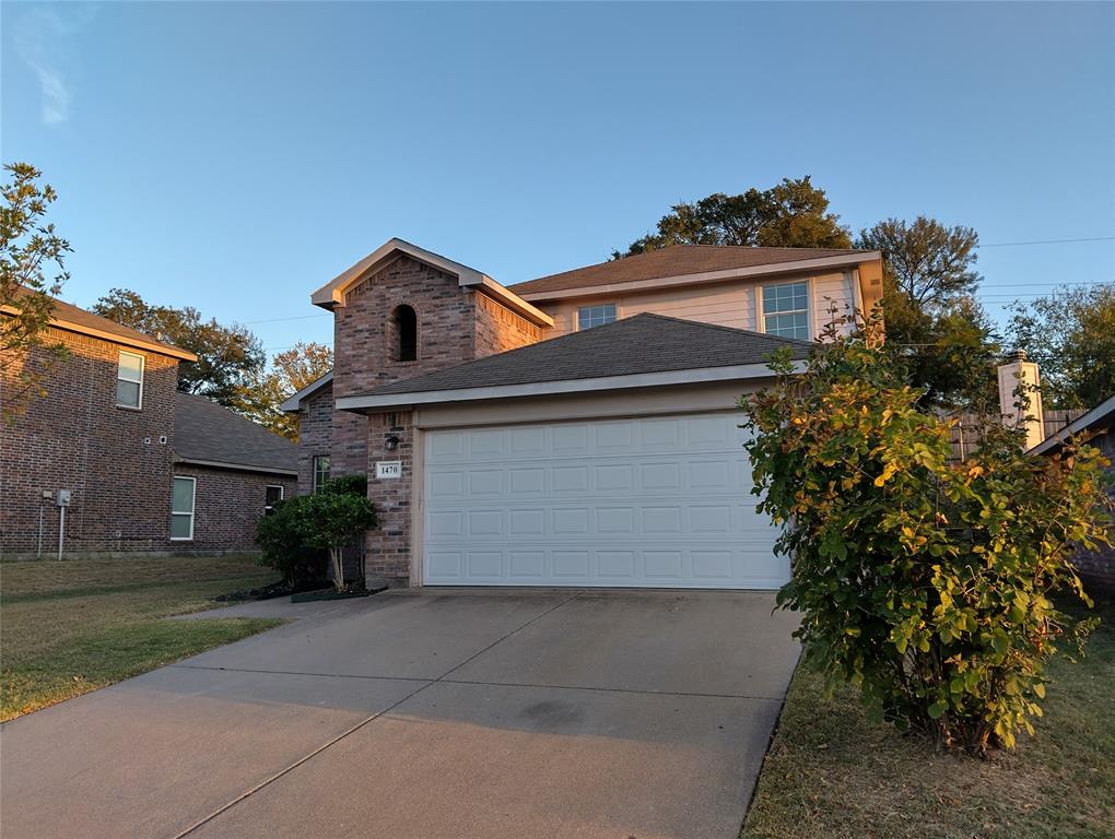 front view of a house with a garage