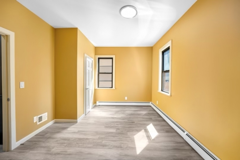 a view of an empty room and window