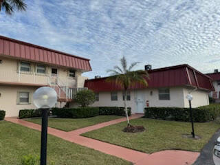 a front view of house with yard