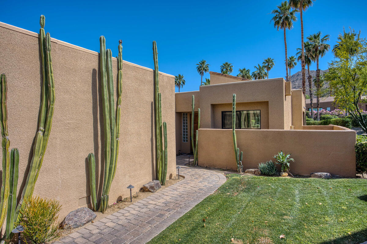 a view of a back yard of the house