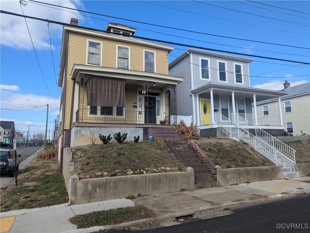 View of front of home with covered porch