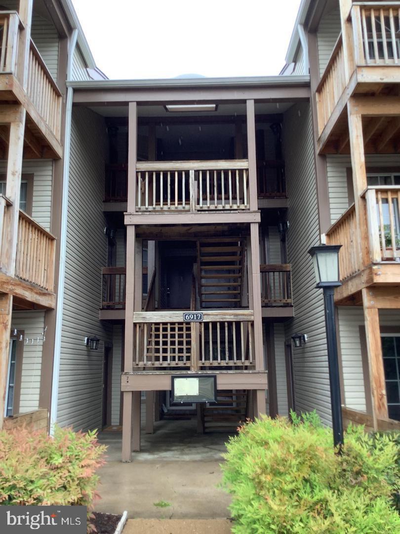 a view of front a house with a balcony