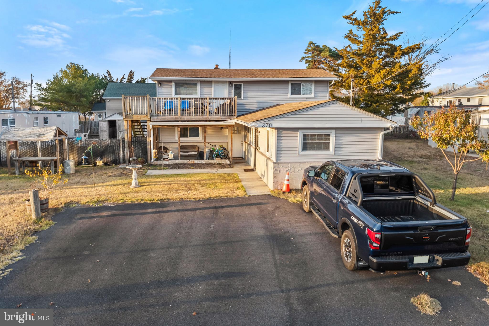 a view of a car park in front of house