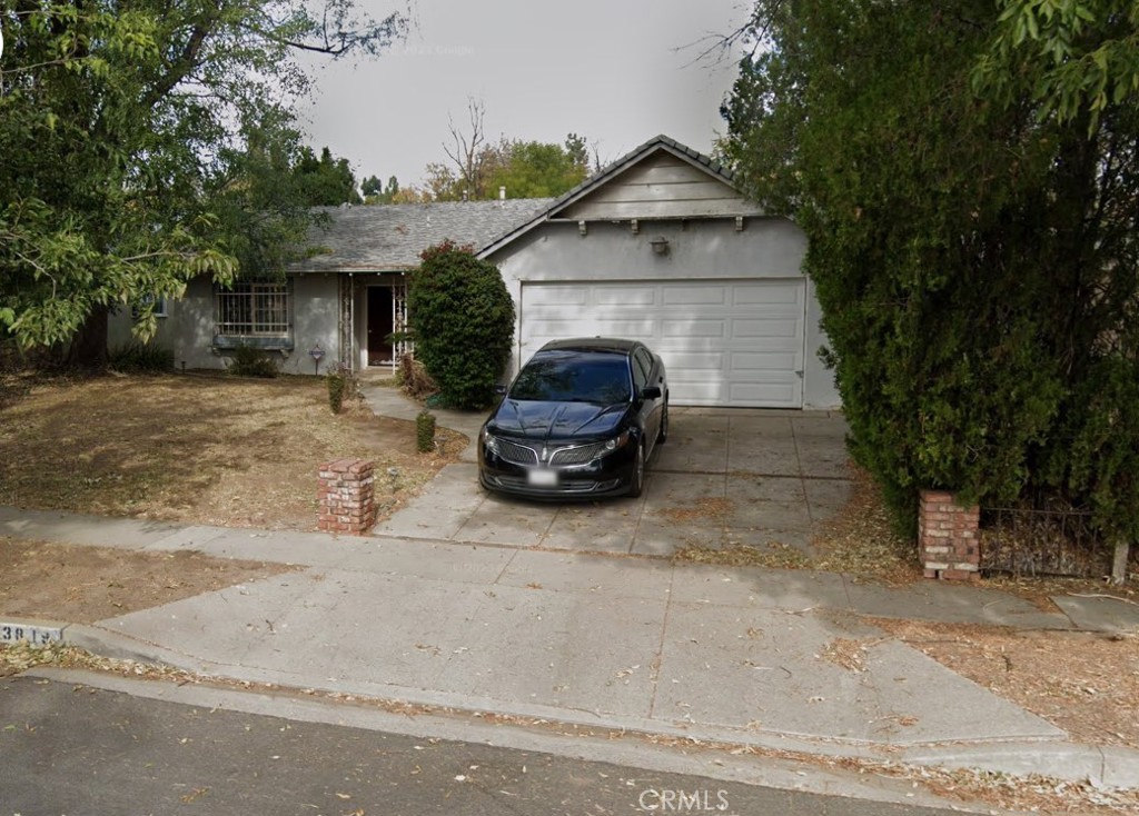 a car parked in front of house