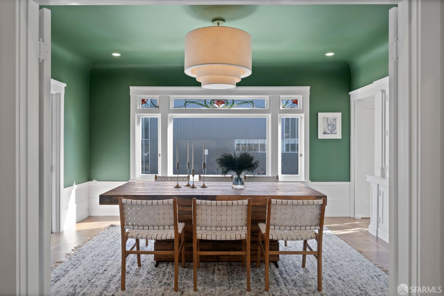 Stunning dining room with stained glass windows