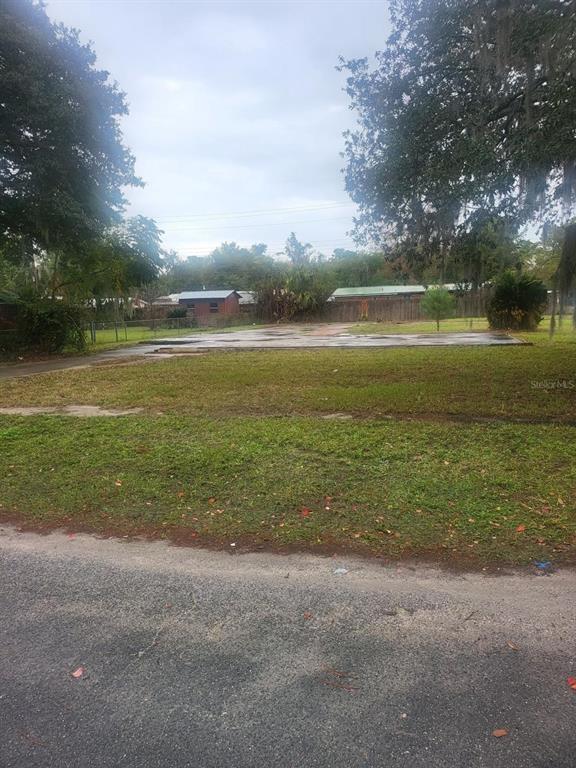 a view of an ocean and a yard