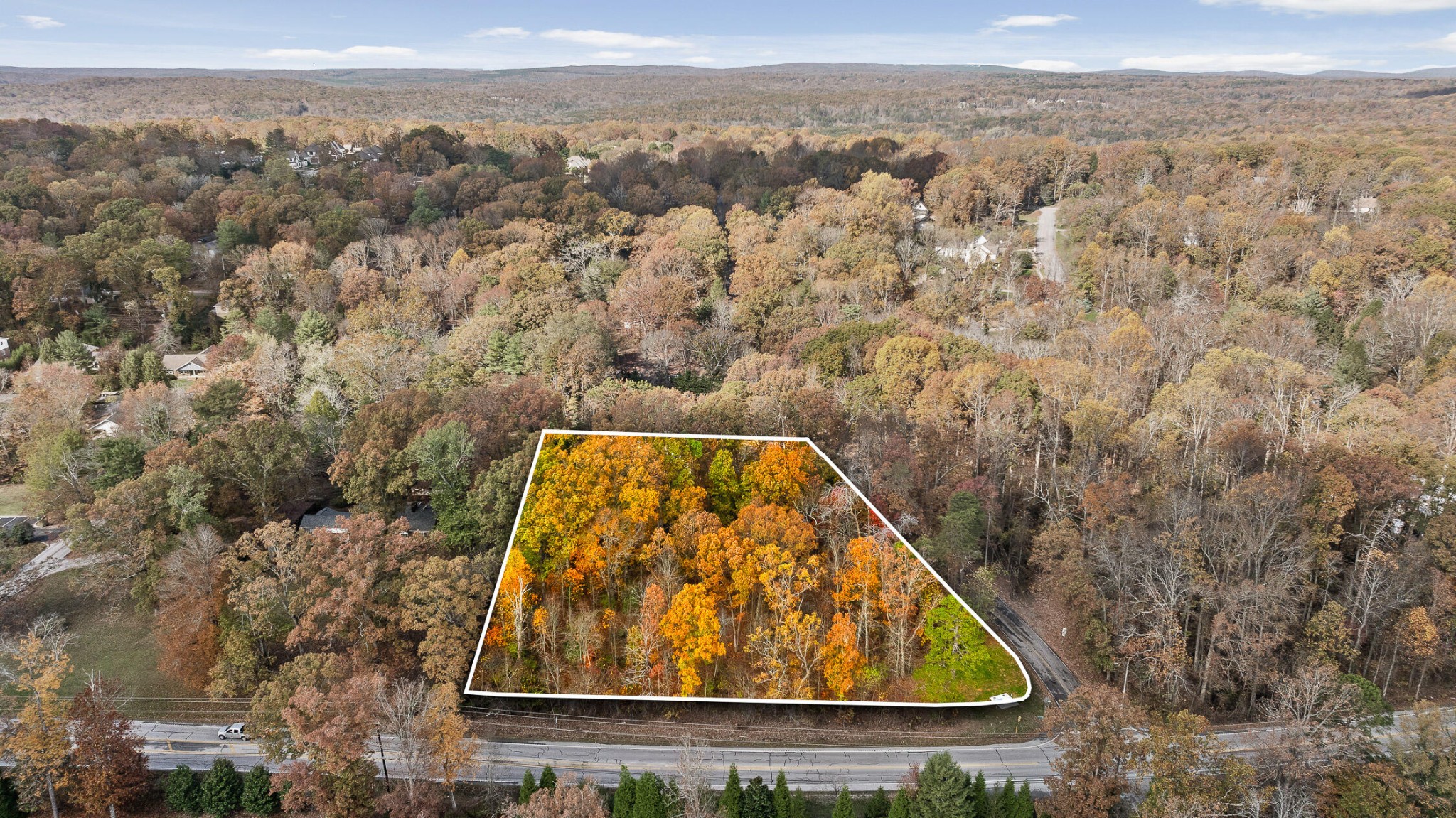 an aerial view of house with yard