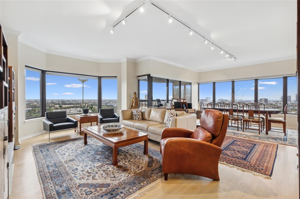 a living room with furniture and a table