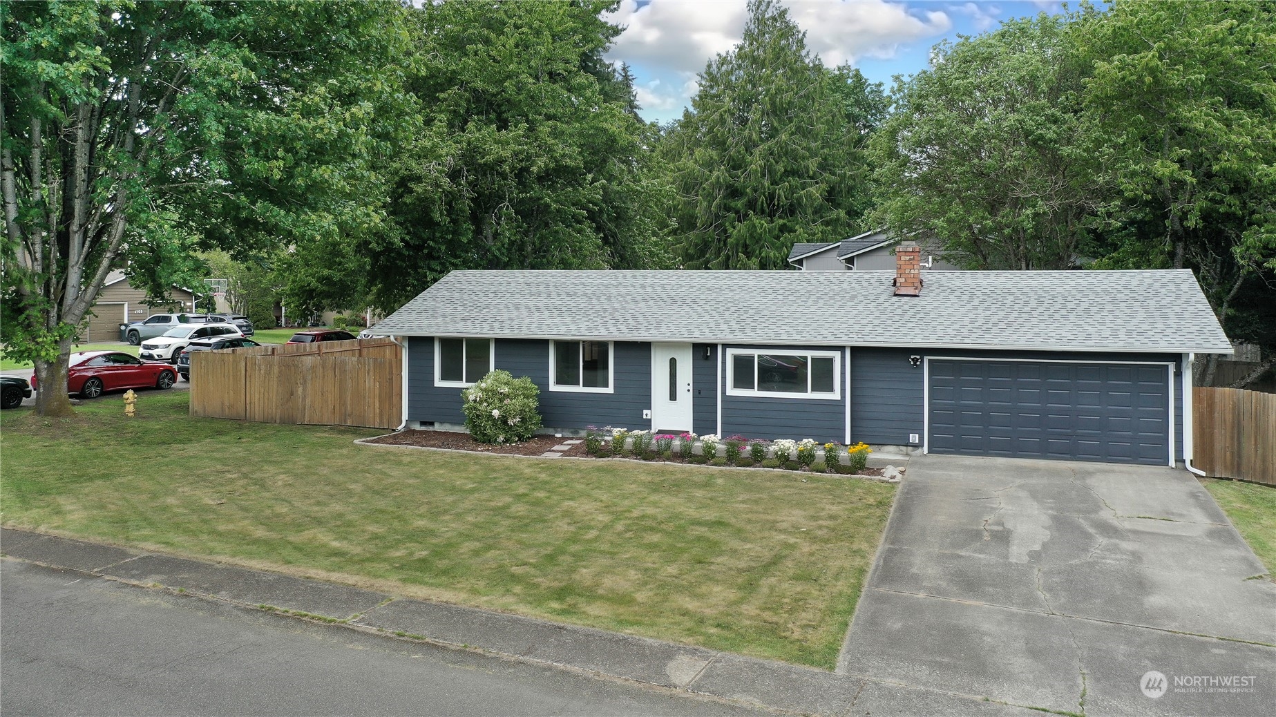 front view of a house with a yard