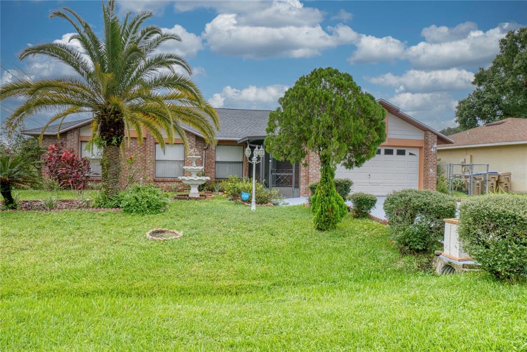 a view of a yard in front of a house