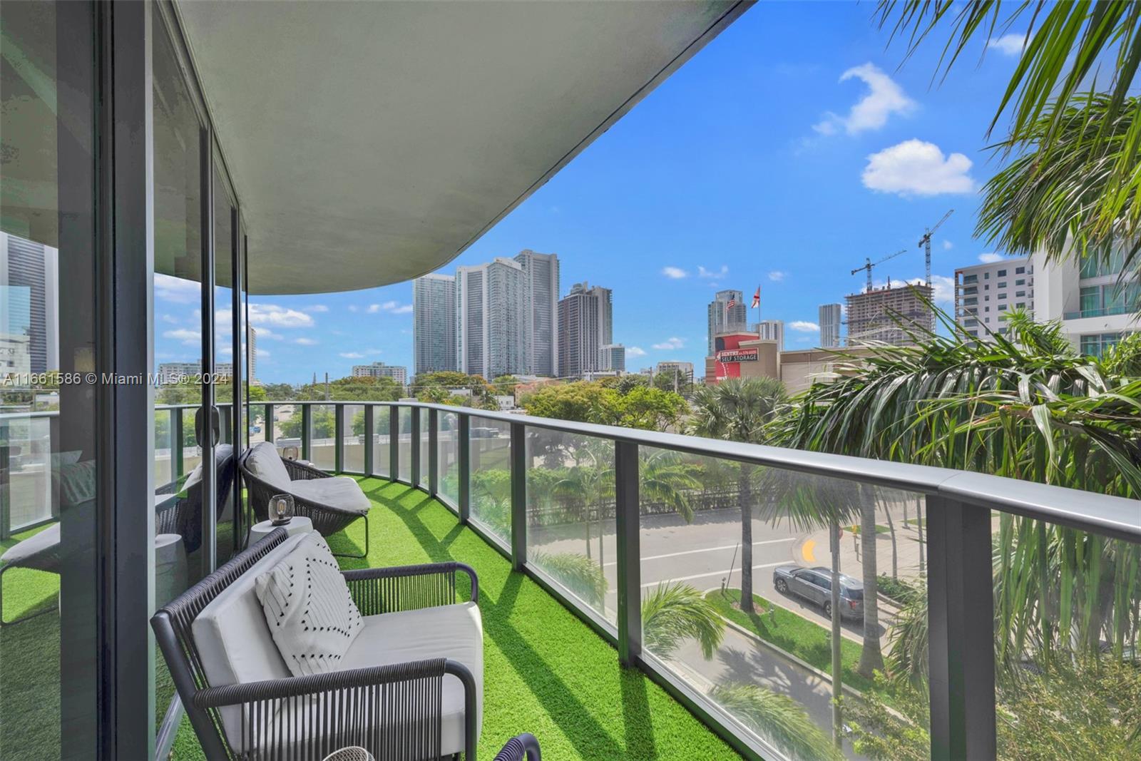 a view of a balcony with wooden floor