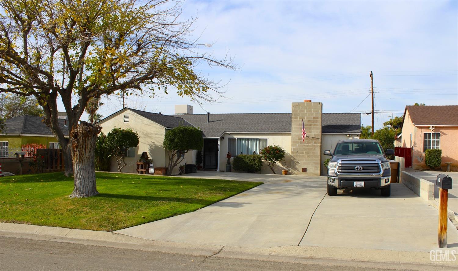 a view of a car parked in front of a building