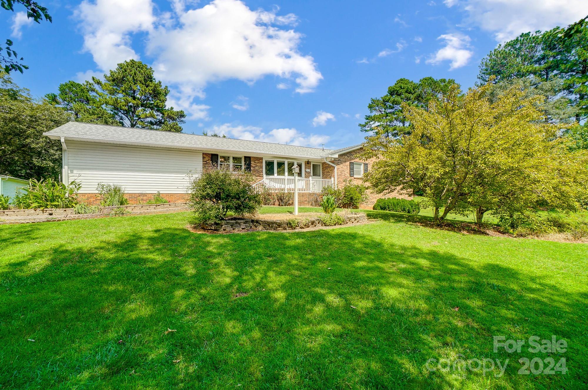 a view of a house with a garden