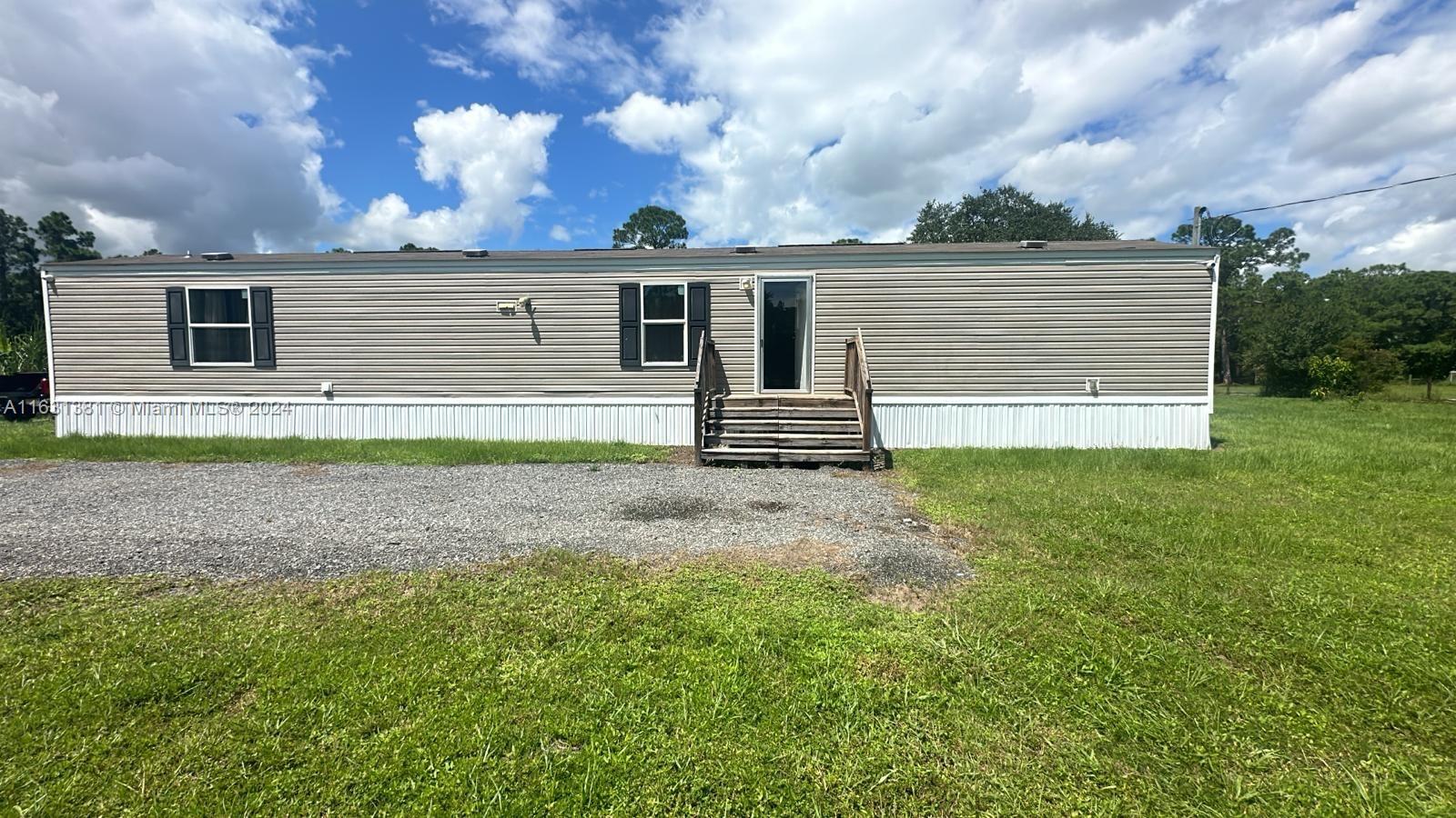 front view of house with a yard