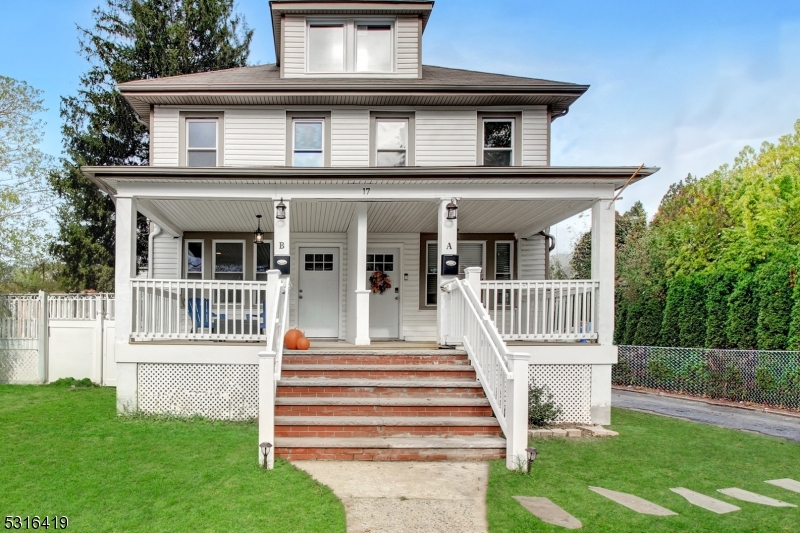 a front view of a house with a porch