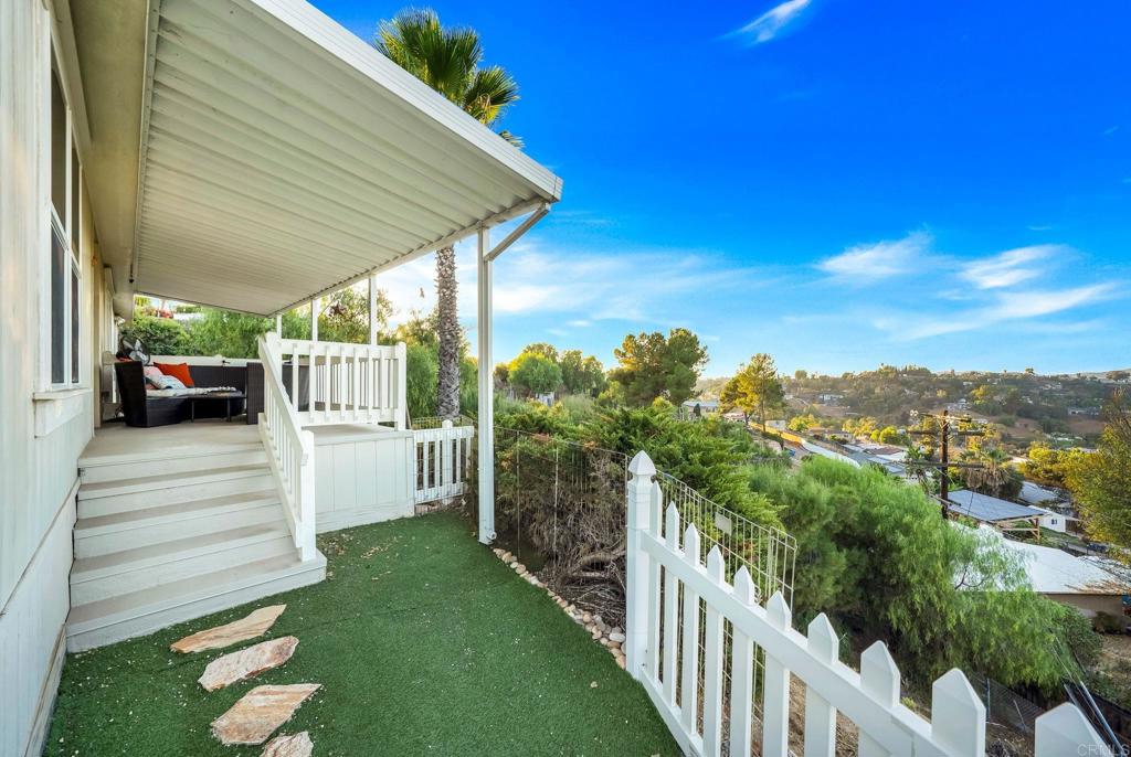 a view of a porch in front of house