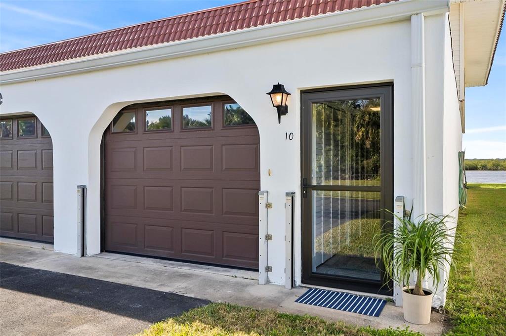 a front view of a house with a glass door